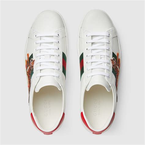 gucci ace studded leather sneaker replica|gucci ace tiger sneakers.